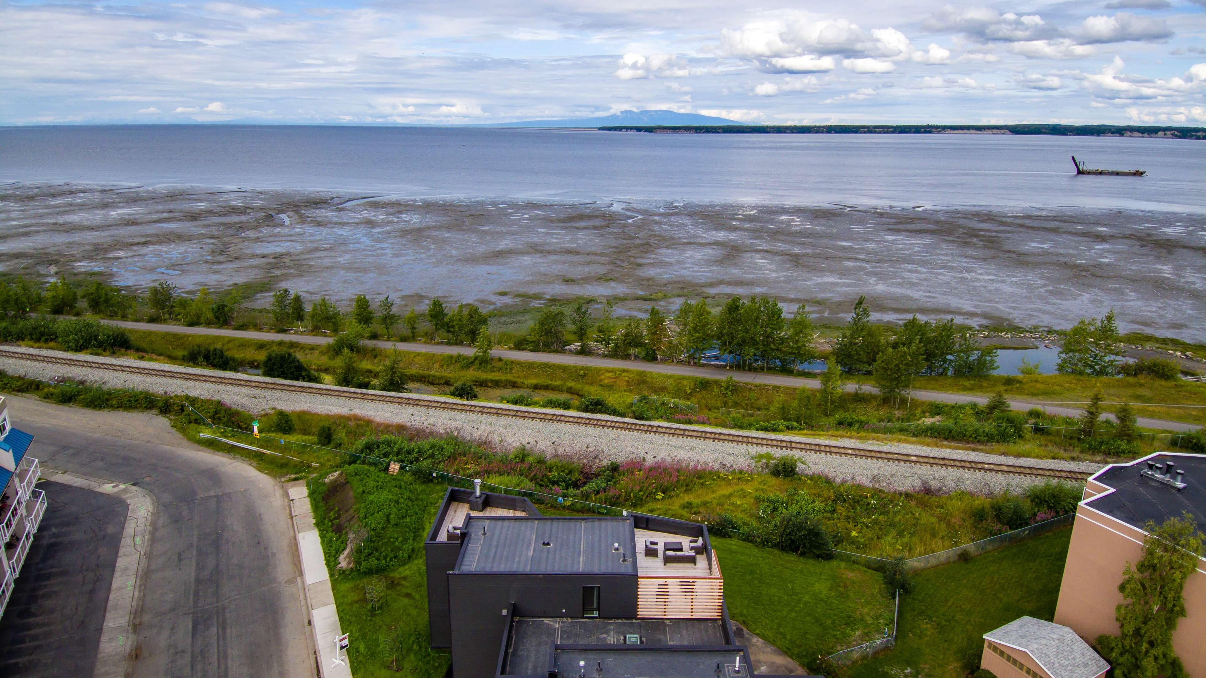 Aerial view of Villa at Bootleggers Landing with Cook Inlet and Chugach Mountains, Anchorage Alaska luxury rental