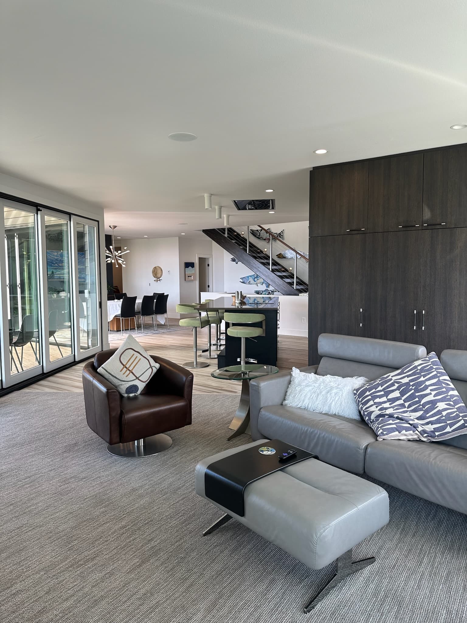 Open-concept living space flowing to gourmet kitchen, Villa at Bootleggers Landing Anchorage