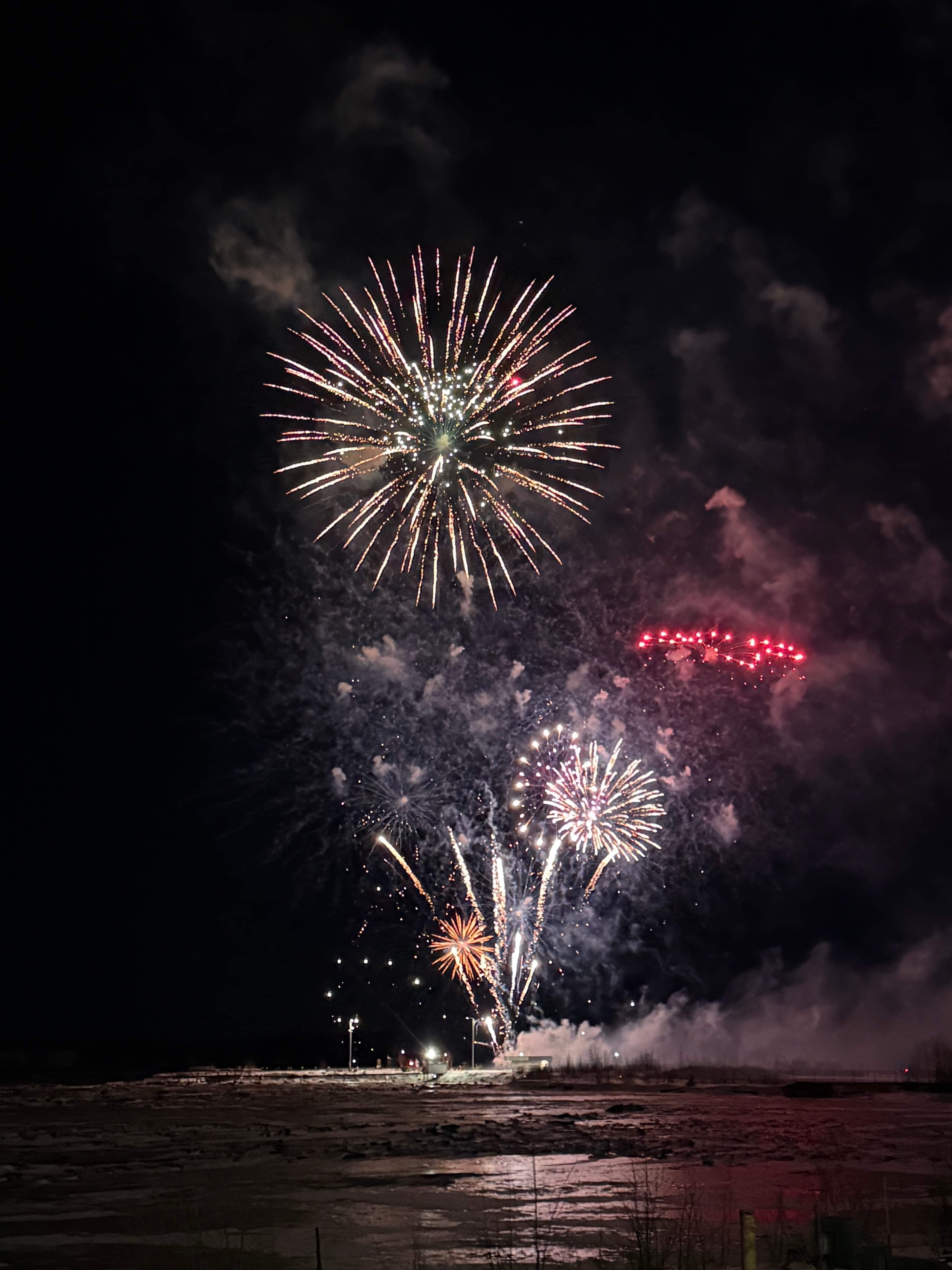 Fourth of July fireworks over Cook Inlet from Villa deck, Anchorage Alaska