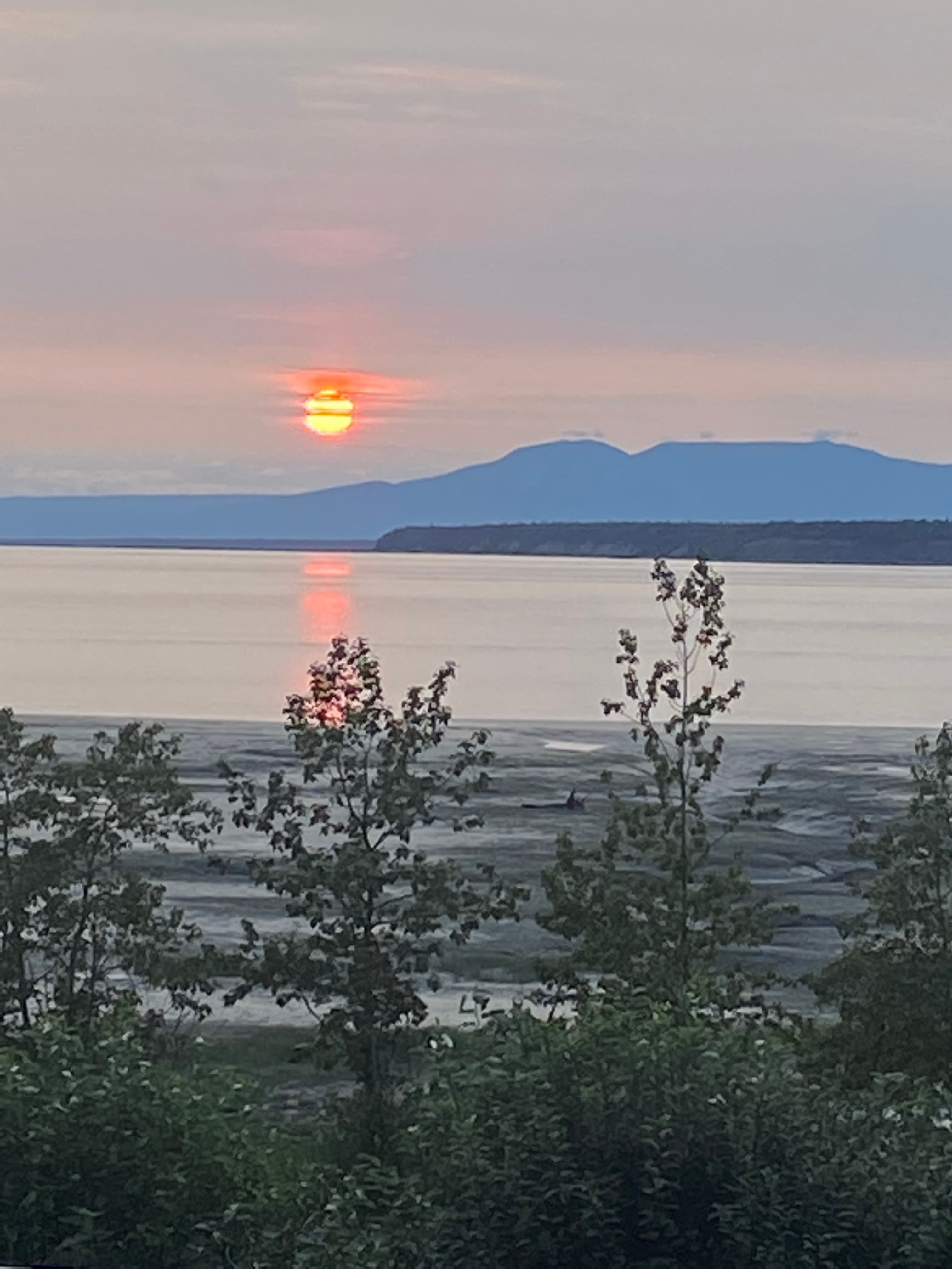 Sunset over mountains and Cook Inlet from Villa, Anchorage waterfront