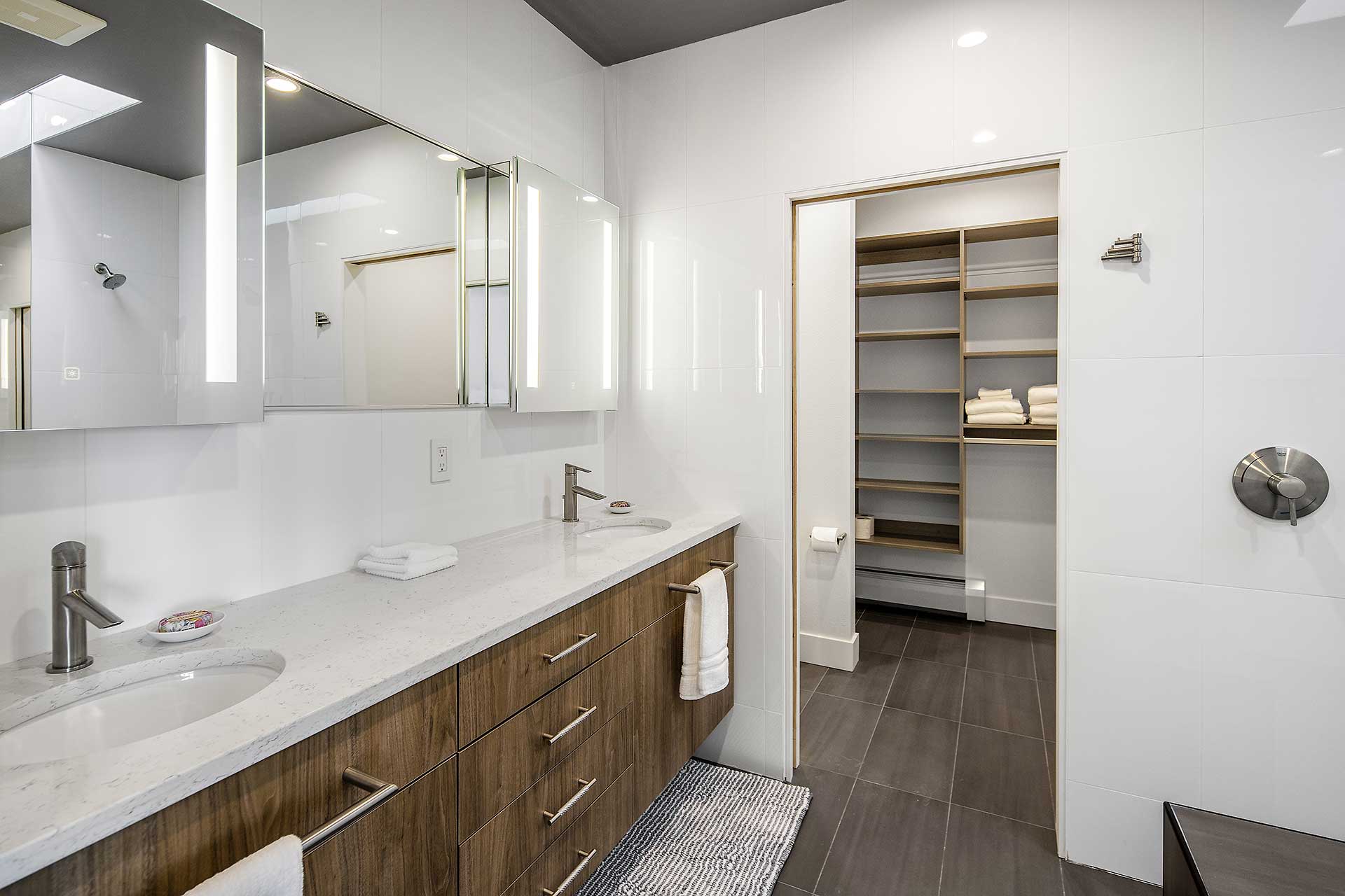 Master bathroom with double vanity and walk-in closet, Villa at Bootleggers Landing spa bathroom