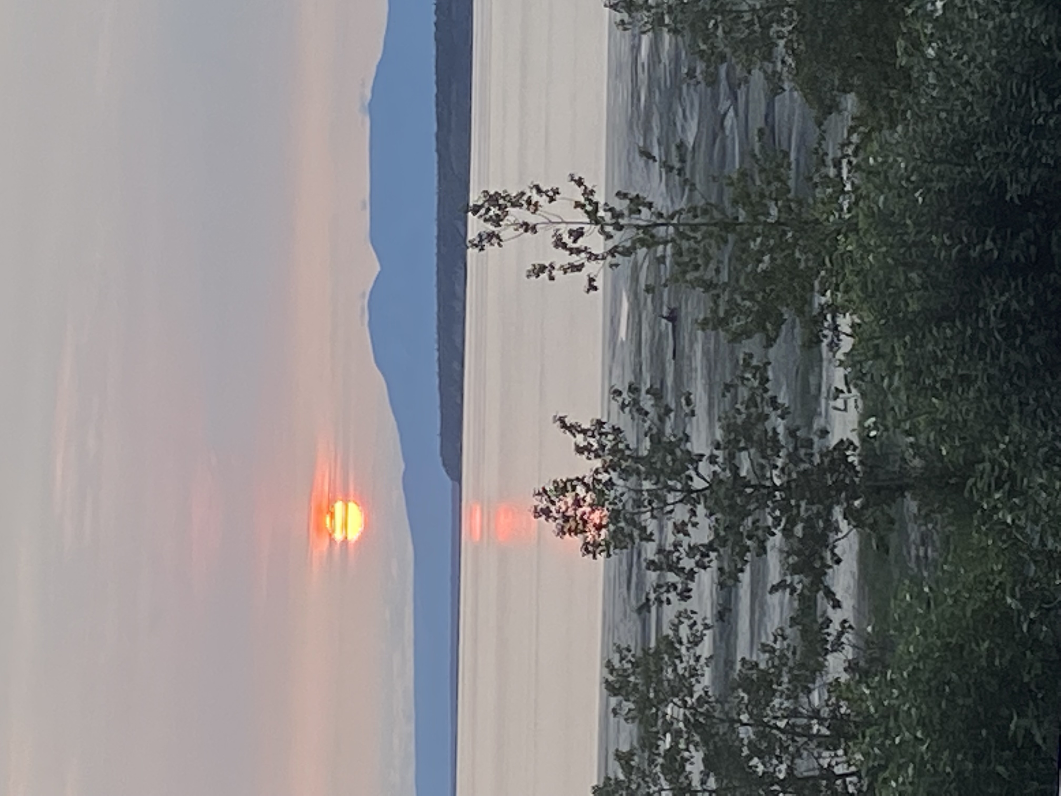 Sunset over mountains and Cook Inlet from Villa, Anchorage waterfront
